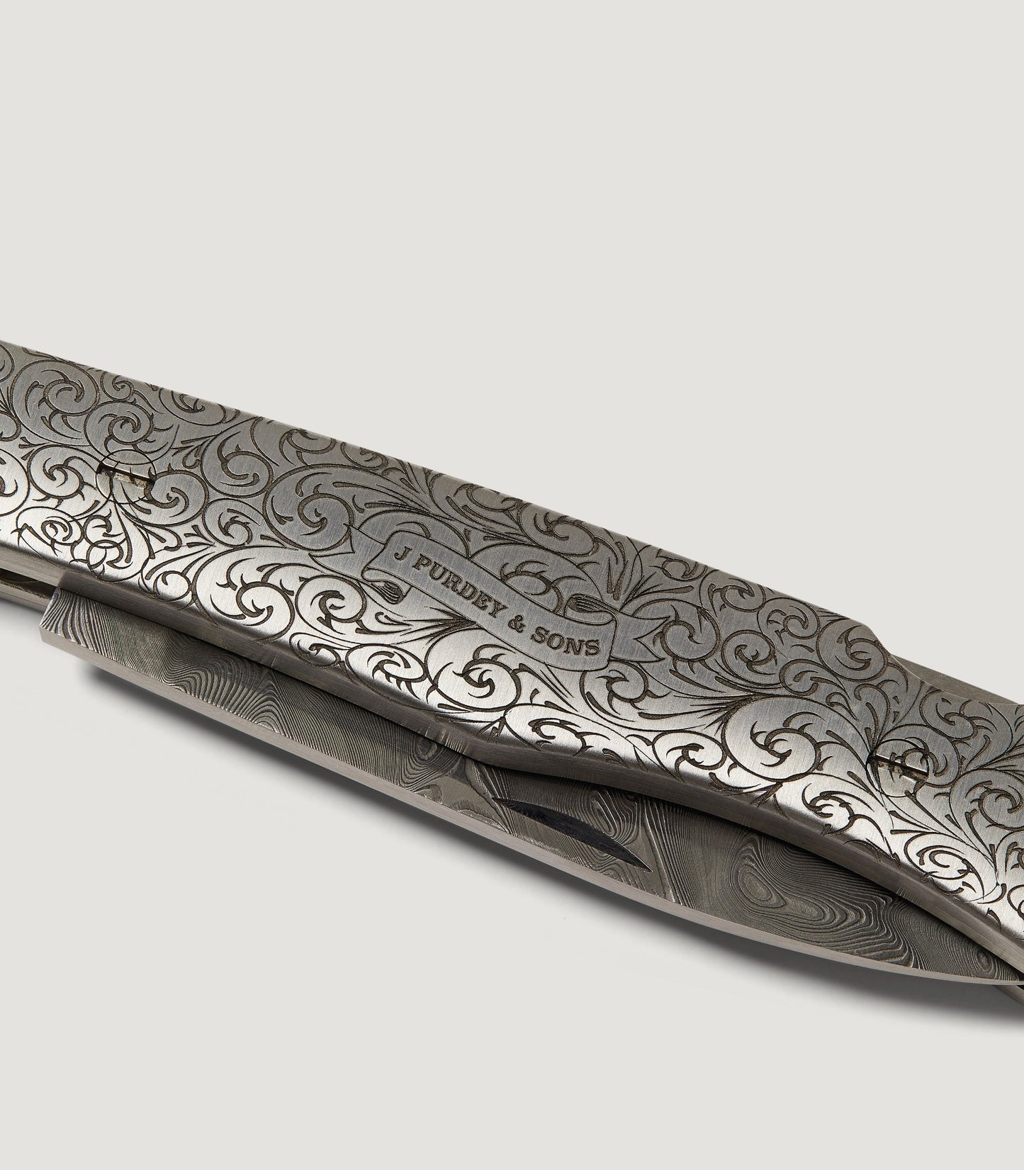 Rose & Scroll Folding Knife